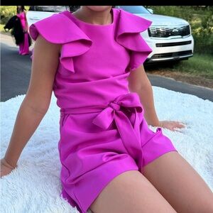 Vibrant Magenta Ruffle Sleeve Romper

Girls size 10
Purchased at dillards